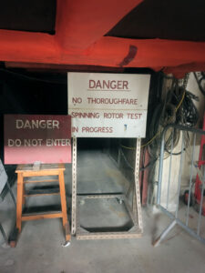 Danger signs that would have been used when spinning rotor or other tests were in progress